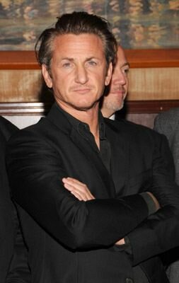 sean-penn-black-suit-arms-folded